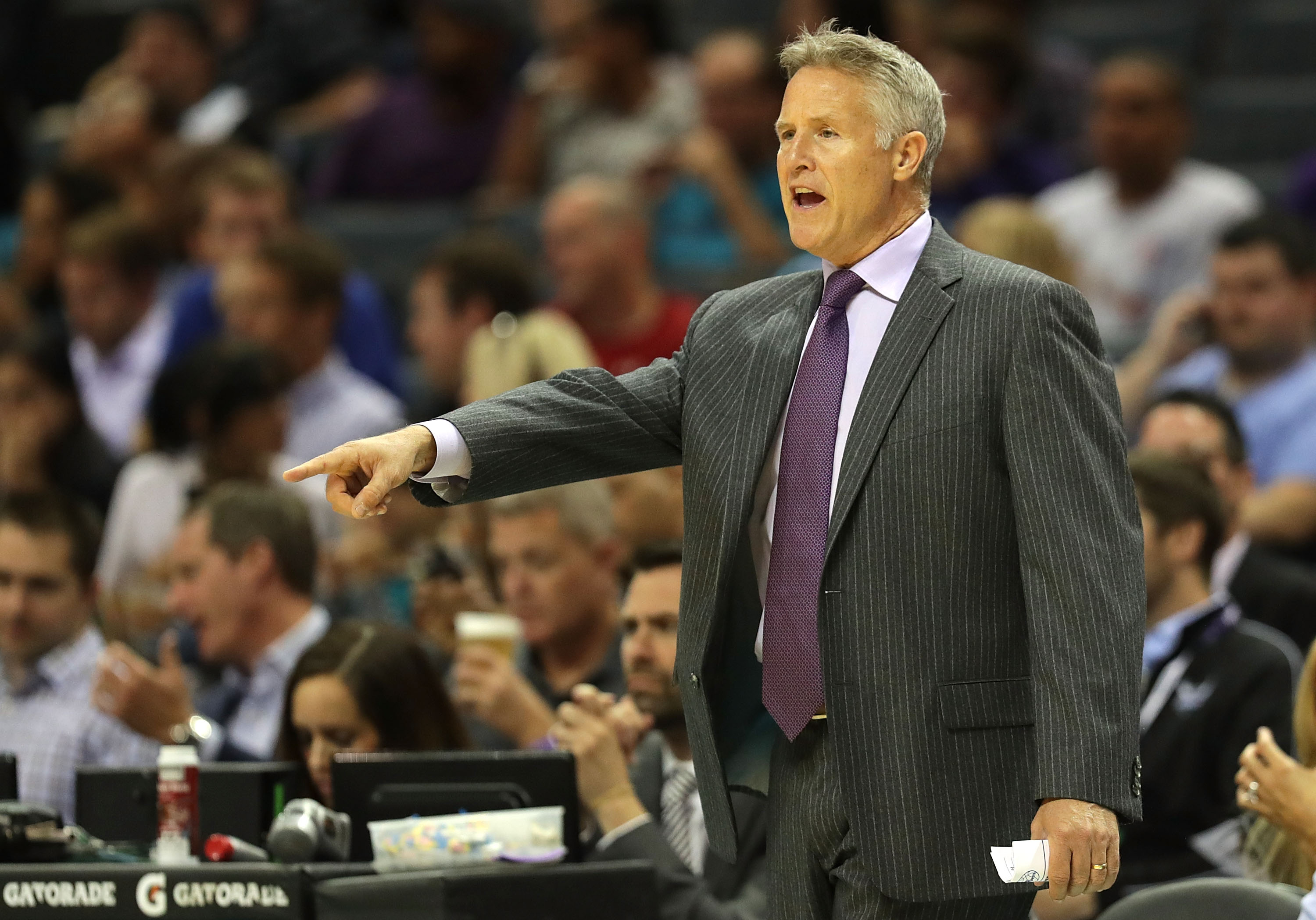 CHARLOTTE, NC - NOVEMBER 02: Brett Brown of the Philadelphia 76ers yells to his team during their game against the Charlotte Hornets at Spectrum Center on November 2, 2016 in Charlotte, North Carolina. NOTE TO USER: User expressly acknowledges and agrees that, by downloading and or using this photograph, User is consenting to the terms and conditions of the Getty Images License Agreement.   Streeter Lecka/Getty Images/AFP