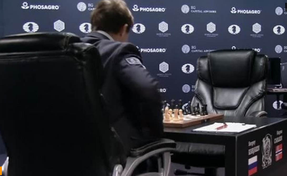 Carlsen salvages draw in game nine of World Chess Championship