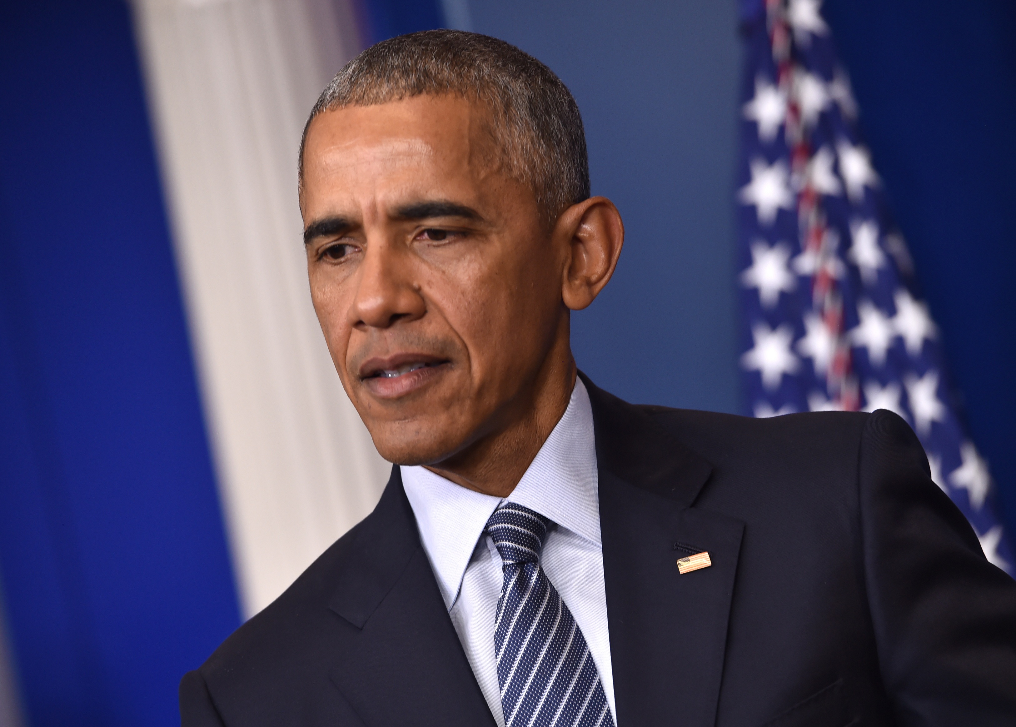 US President Barack Obama speaks during a press conference, on November 14, 2016 at the White House in Washington, DC. US President Barack Obama admitted Monday that he still has concerns about Donald Trump but was comforted that his successor appears pragmatic rather than ideological. / AFP PHOTO / Nicholas Kamm