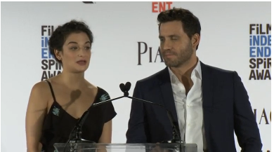 NOMINATION PRESENTERS JENNY SLATE AND EDGAR RAMIREZ ON STAGE (photo courtesy of Reuters video file)