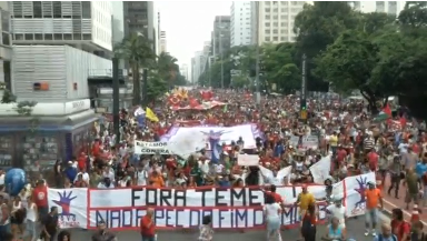 General of massive demonstration with banner reading, "Out with temer, no to the end of the world (spending caps) pec (amendment)" in Portuguese. (Photo courtesy of Reuters video clip)