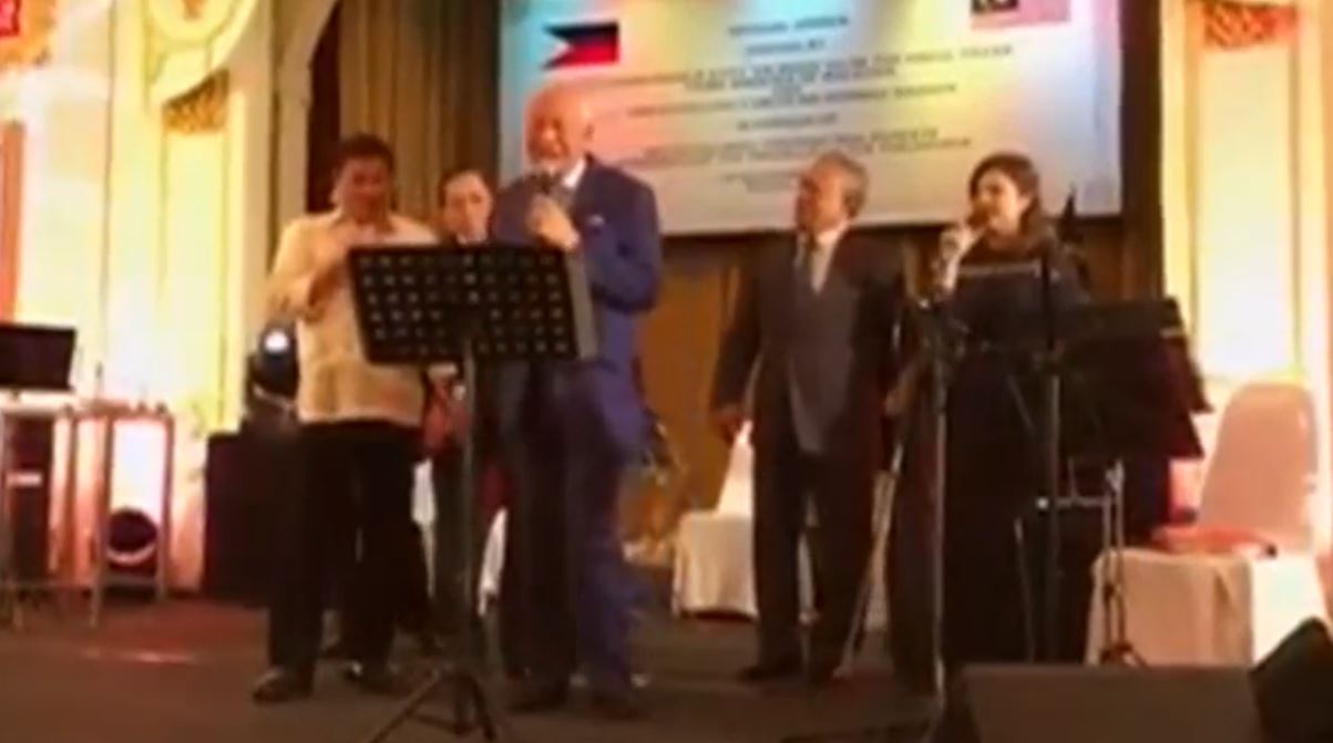 President Duterte and Prime MInister Razak sing a duet of Danish band The Walkers' "Sha-la-la-la-la" which ended in a round of applause. (Photo grabbed from Reuters video)