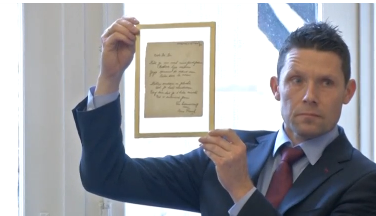A handwritten poem by Anne Frank is sold for 140,000 euros at an auction in the Netherlands (Photo courtesy of Reuters video file)