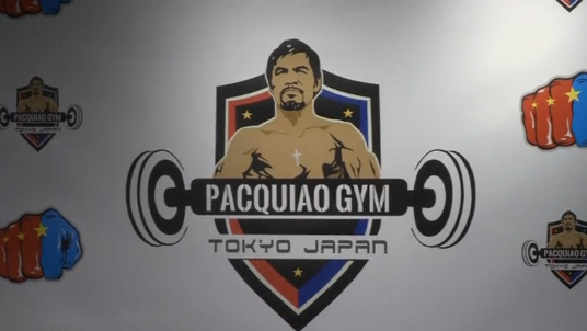 Sign on stage reading 'Pacquiao Gym tokyo Japan' (Photo courtesy of Reuters video file)