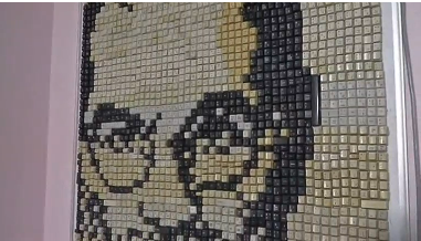 JOBS' PORTRAIT MADE OF KEYBOARD KEYS. (Photo courtesy of Reuters video clip)