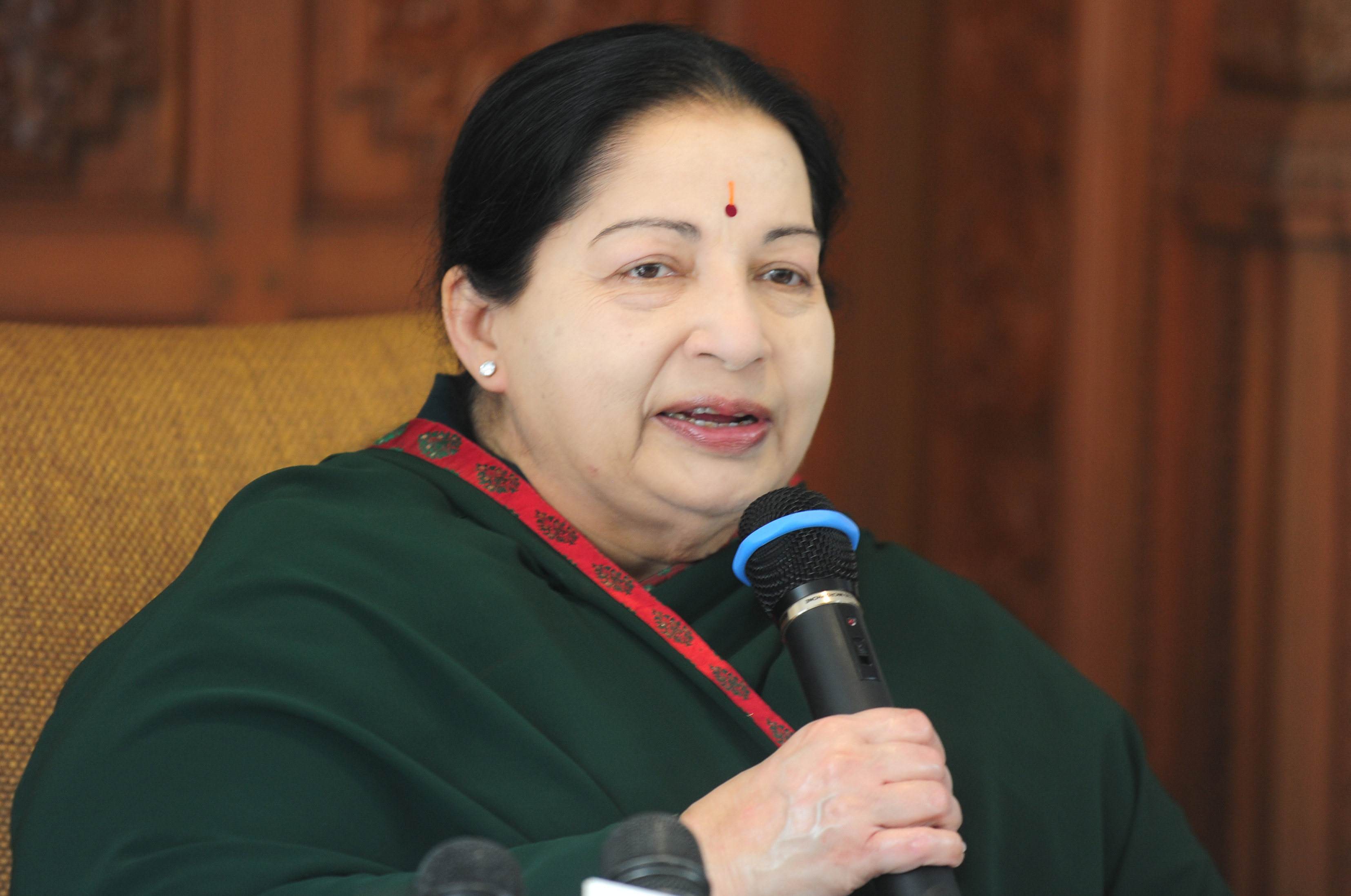 All India Anna Dravida Munnetra Kazhagam (AIADMK) leader Jayalalithaa Jayaram speaks during a media briefing in Chennai on May 19, 2016. The makeup of India's next government could lie in the hands of a trio of women who command a massive following in their regional heartlands, including a populist former movie star known as "Mother" to supporters. / AFP PHOTO / ARUN SANKAR