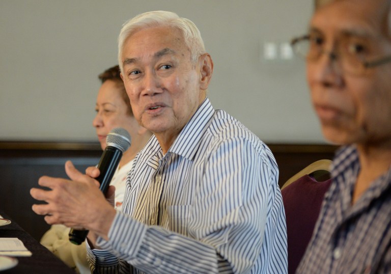 (File photo) Luis Jalandoni (C), Chief negotiator for a decades-old Philippine Maoist insurgency speaks while Alan Jasminez (R), and Connie Ledesma (L) consultants of the communist party peace negotiating panel, listen during the FOCAP forum in Manila on September 29, 2016, ahead of the October 6 resumption of peace talks hosted by Norway, where a longer ceasefire is expected to be signed / AFP PHOTO / TED ALJIBE