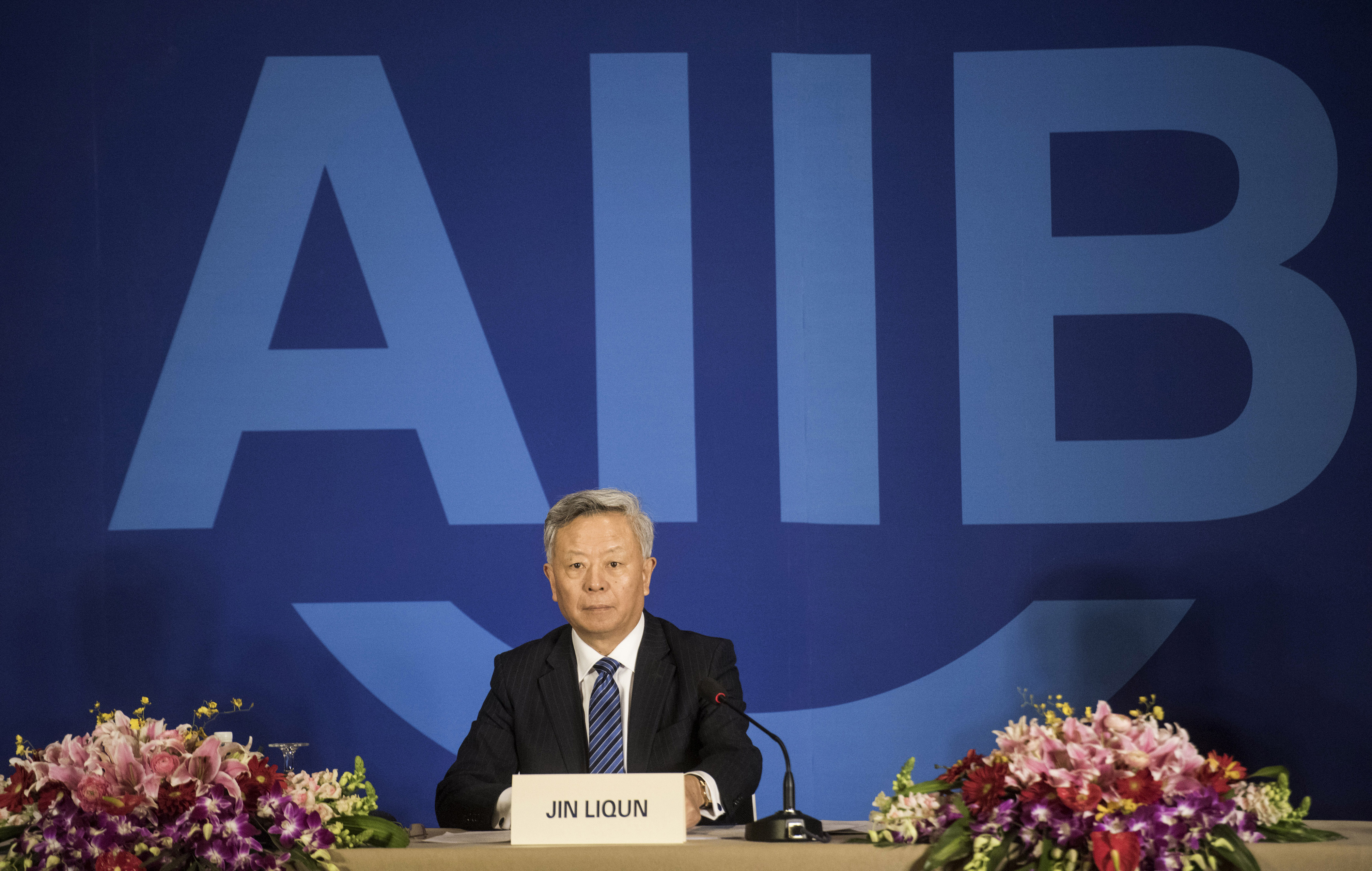 Jin Liqun, the first president of the Asian Infrastructure Investment Bank (AIIB), speaks to journalists during a press conference in Beijing on January 17, 2016. The new Asian Infrastructure Investment Bank will boost investment in the region while contributing to "fairer" global economic governance, Chinese President Xi Jinping said on January 16 at the formal opening ceremony in Beijing. The China-backed AIIB -- which has 57 members including major economies such as Australia and South Korea but notably excluding the US and Japan -- is viewed by some as a rival to the World Bank and Asian Development Bank (ADB). AFP PHOTO / FRED DUFOUR / AFP PHOTO / FRED DUFOUR
