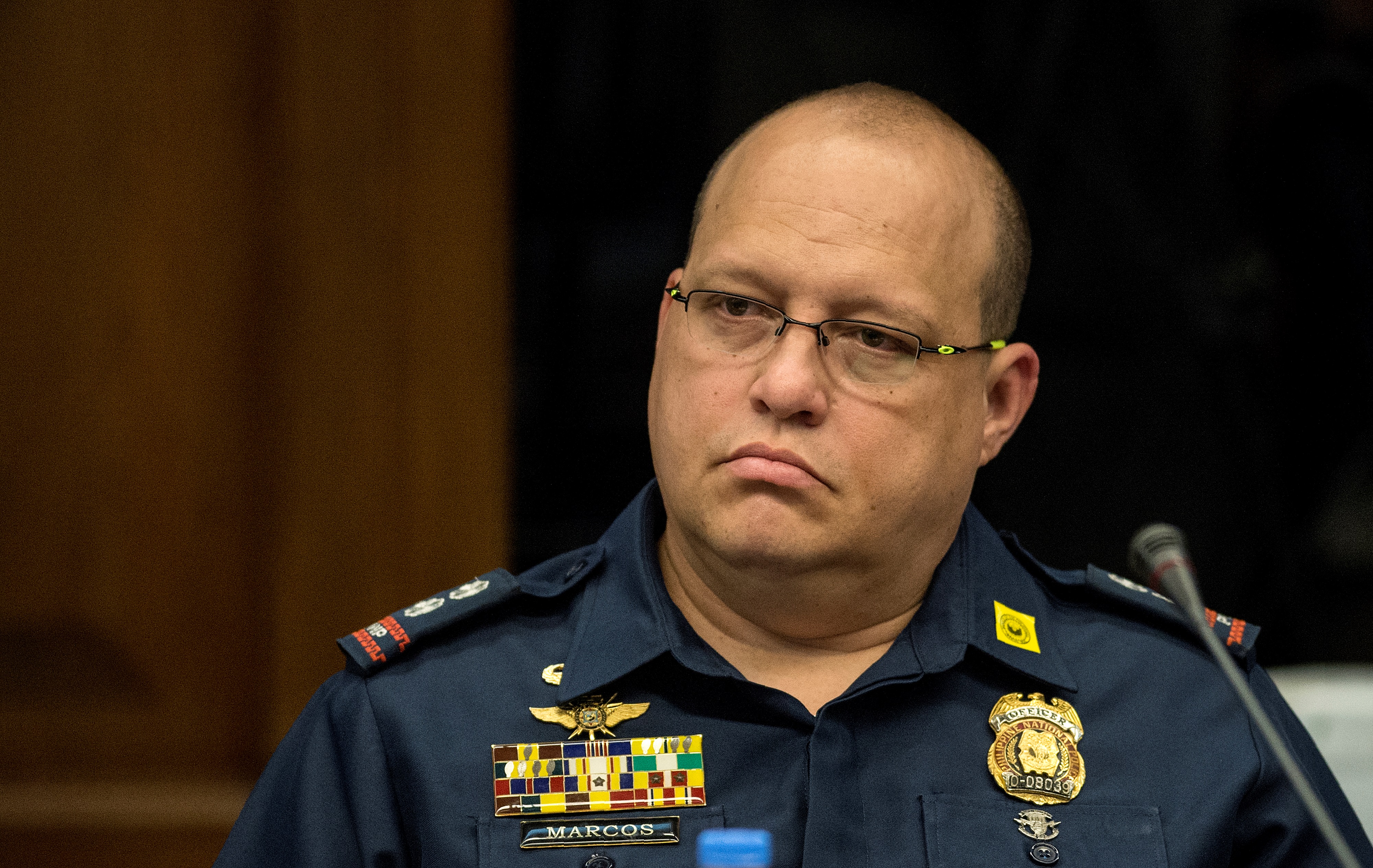 Criminal Investigation and Detection Group (CIDG) Superintendent Marvin Marcos, attends the Senate drug hearing at the Senate building in Manila on November 23, 2016. Kerwin was arrested in the United Arab Emirates last month and will face drug trafficking charges. / AFP PHOTO / NOEL CELIS