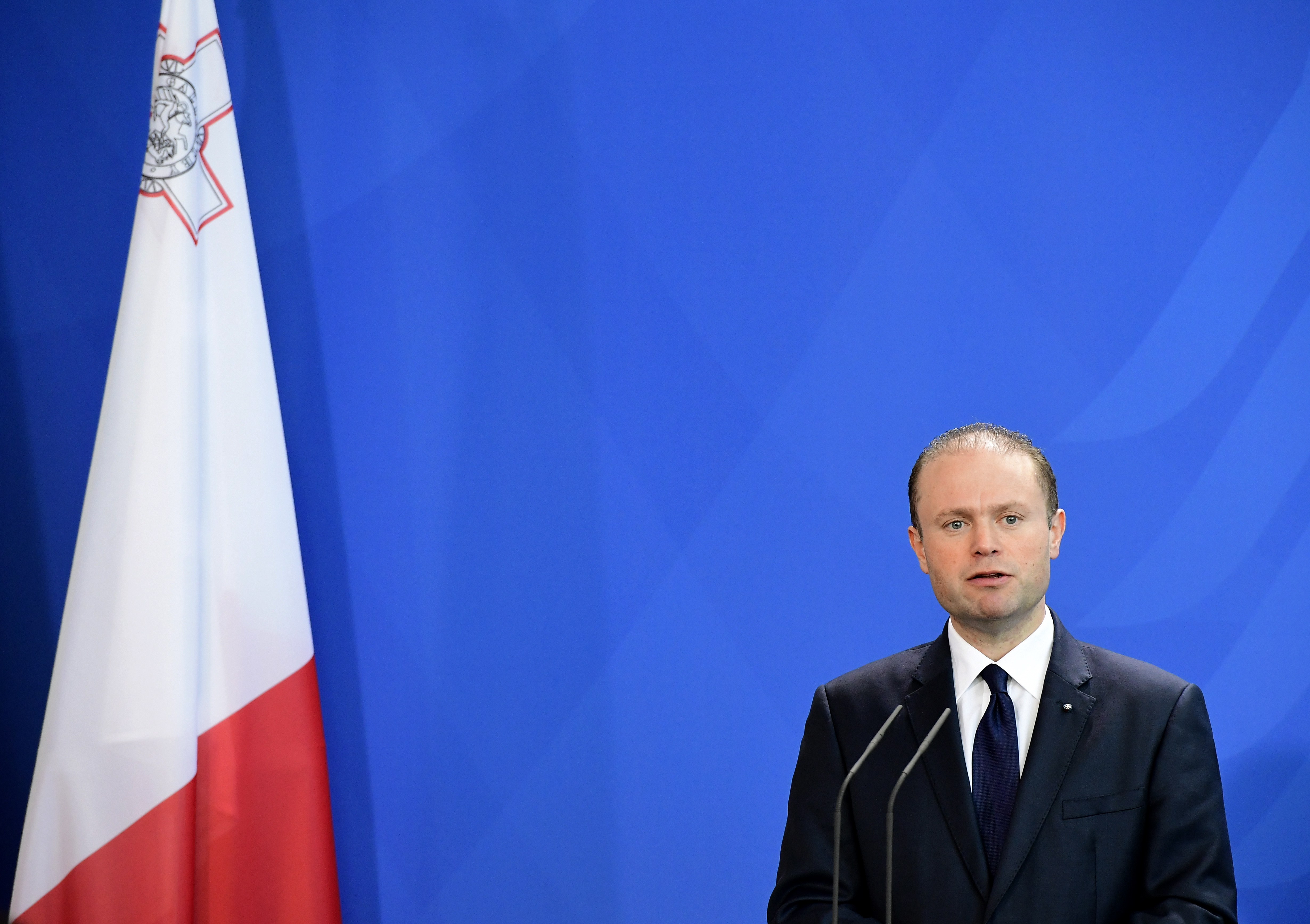 Malta's Prime minister Joseph Muscat attends a press conference after talks with German chancellor Angela Merkel(unseen) in Berlin on November 29, 2016. / AFP PHOTO / TOBIAS SCHWARZ