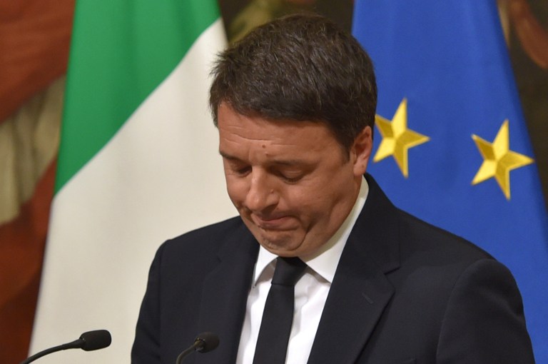 Italy's Prime Minister Matteo Renzi announces his resignation during a press conference at the Palazzo Chigi following the results of the vote for a referendum on constitutional reforms, on December 5, 2016 in Rome. "My experience of government finishes here," Renzi told a press conference after the No campaign won what he described as an "extraordinarily clear" victory in the referendum on which he had staked his future.  / AFP PHOTO / Andreas SOLARO / The erroneous mention[s] appearing in the metadata of this photo by Andreas SOLARO has been modified in AFP systems in the following manner: [December 5, 2016] instead of [December 4, 2016]. Please immediately remove the erroneous mention[s] from all your online services and delete it (them) from your servers. If you have been authorized by AFP to distribute it (them) to third parties, please ensure that the same actions are carried out by them. Failure to promptly comply with these instructions will entail liability on your part for any continued or post notification usage. Therefore we thank you very much for all your attention and prompt action. We are sorry for the inconvenience this notification may cause and remain at your disposal for any further information you may require.