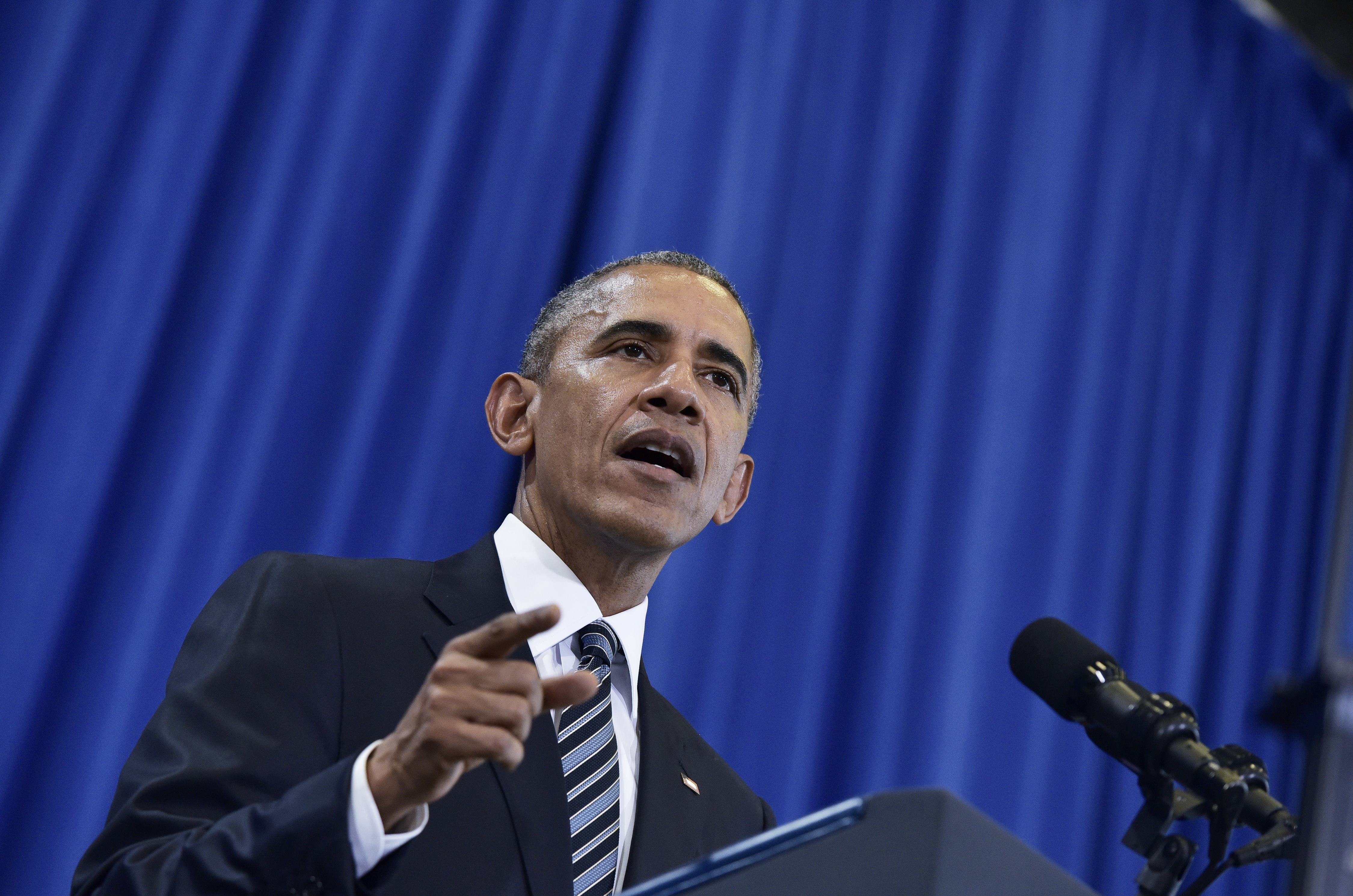 US President Barack Obama speaks on counterterrorism at MacDill Air Force Base in Tampa, Florida on December 6, 2016. / AFP PHOTO / MANDEL NGAN