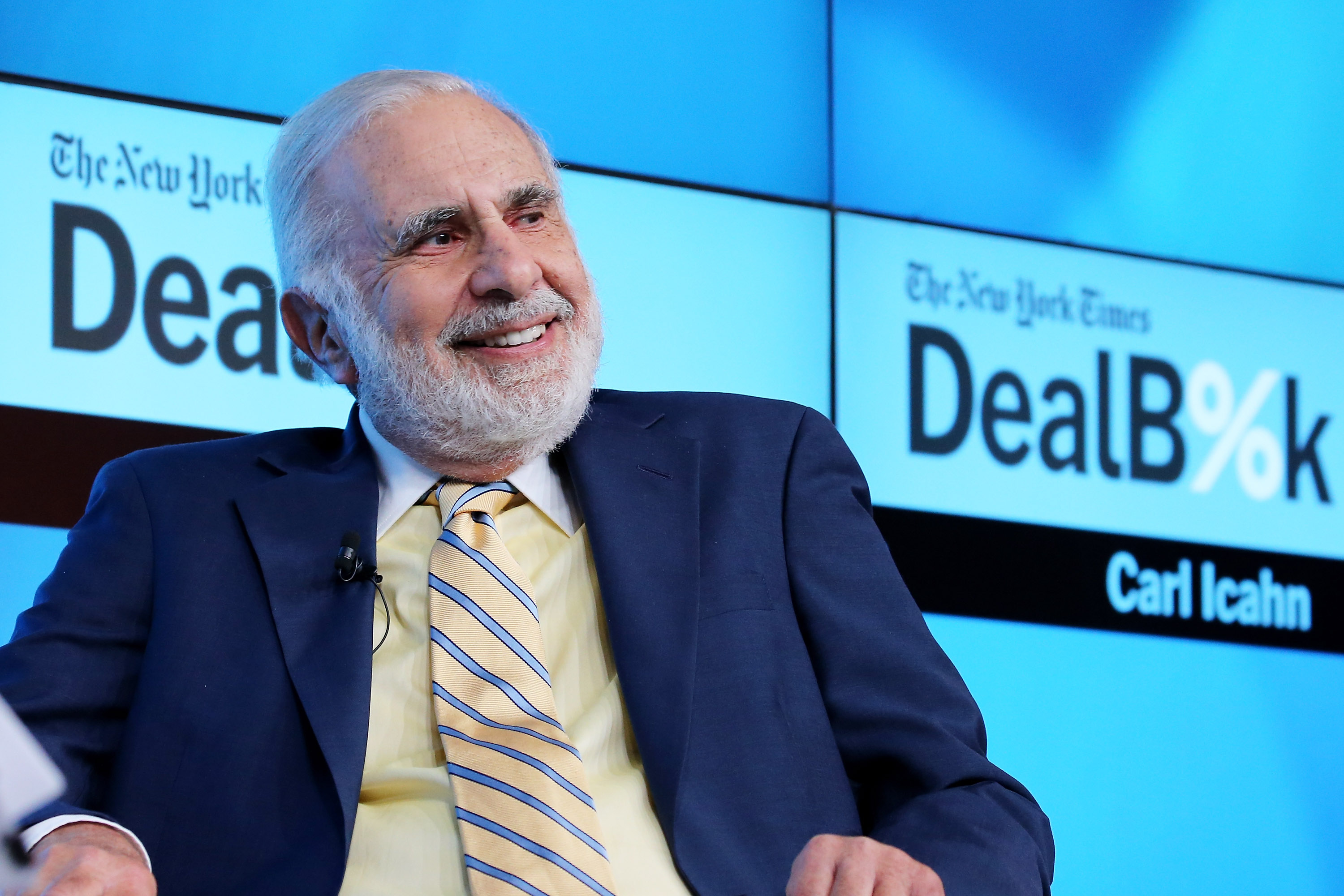 (FILES) This file photo taken on November 3, 2015 shows Chairman of Icahn Enterprises Carl Icahn participating in a panel discussion at the New York Times 2015 DealBook Conference at the Whitney Museum of American Art in New York City. President-elect Donald Trump said December 21, 2016 he is naming billionaire Carl Icahn, a vocal critic of government overregulation, to serve as a special advisor to overhaul "strangling regulations." The 80-year-old Icahn, who is known as aggressive, activist investor in the companies he is involved with, will not be a government employee, will not receive a salary and will not be bound by ethics rules requiring him to divest his investments. / AFP PHOTO / GETTY IMAGES NORTH AMERICA / Neilson Barnard