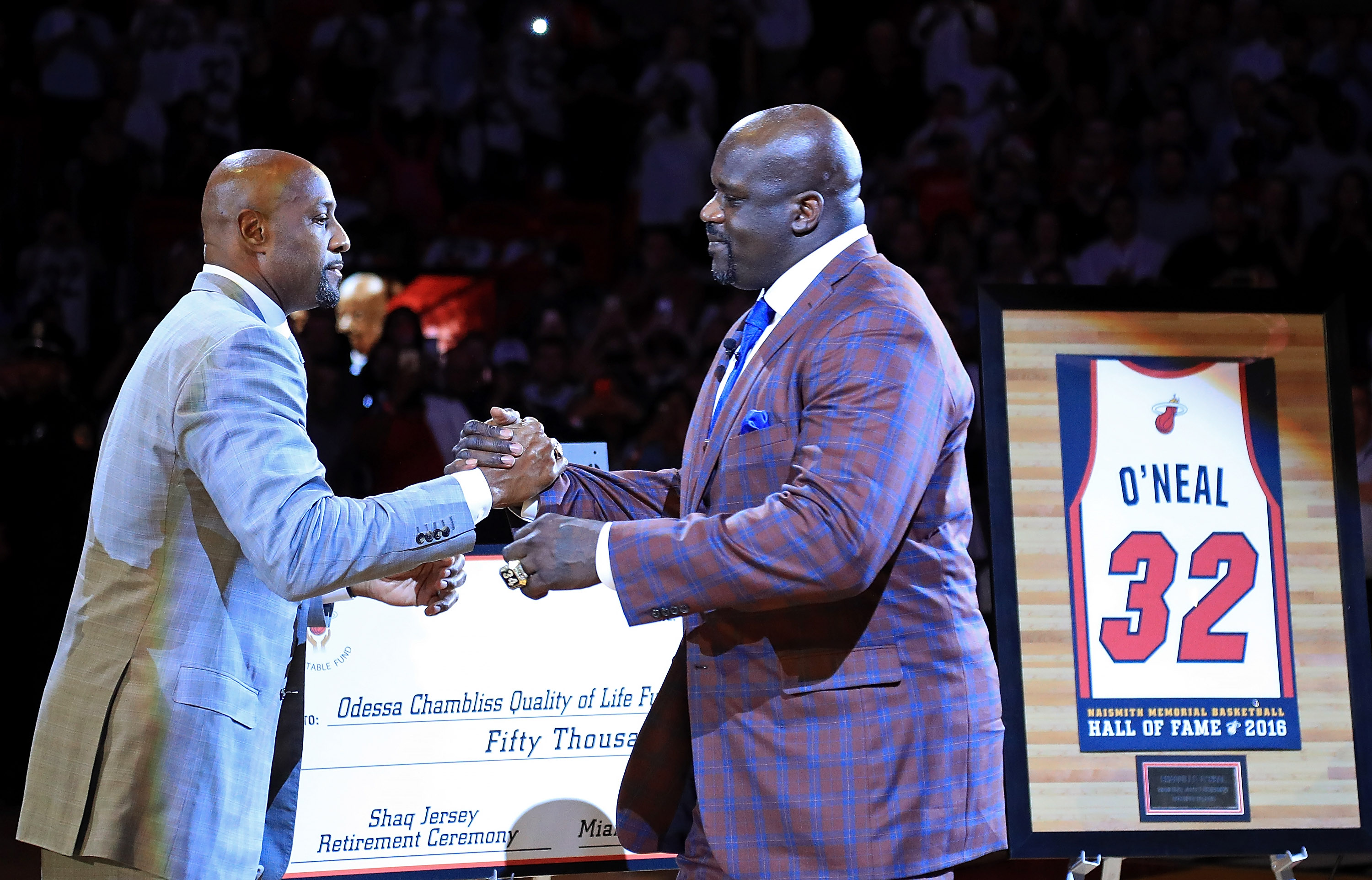MIAMI, FL - DECEMBER 22: Former teammate Alonzo Mourning speaks during a ceremony to honor Shaquille O'Neal as he has his number retired during a game between the Miami Heat and the Los Angeles Lakers at American Airlines Arena on December 22, 2016 in Miami, Florida. NOTE TO USER: User expressly acknowledges and agrees that, by downloading and or using this photograph, User is consenting to the terms and conditions of the Getty Images License Agreement.   Mike Ehrmann/Getty Images/AFP