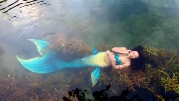 It's a whole new world for swimmers at a mermaid course in one Chinese aquarium, where pupils are taught how to dive and move gracefully through the water like the mystical aquatic creature. (Photo grabbed from Reuters video)