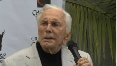 Kirk Douglas, the cleft-chinned movie star who fought gladiators, cowboys and boxers on the screen and the Hollywood establishment off it, celebrates his 100th birthday on Friday, December 9. (Photo courtesy of Reuters video file)