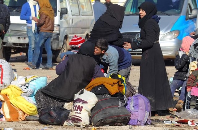 Evacuees from a rebel-held area of Aleppo arrive at insurgent-held al-Rashideen, Syria December 19, 2016. REUTERS/Ammar Abdullah