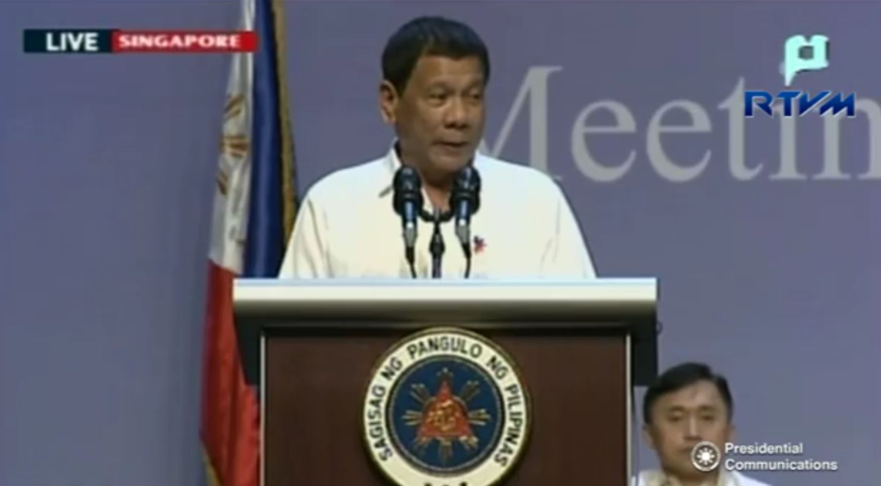 President Rodrigo Duterte addresses overseas Filipino workers in Singapore on Friday (December 16, 2016) on the last leg of his two-day state visit. (Photo grabbed from RTVM video)