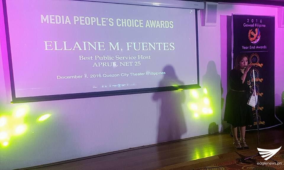 Eagle News Service's Current Affairs host, Ellaine Fuentes, accepts the award as "Best Public Service Host" in the recent Gawad Pilipino Media People's Choice Awards at the Qeuzon City Theater on Wednesday, December 7. (Photo courtesy Kit Matienzo)