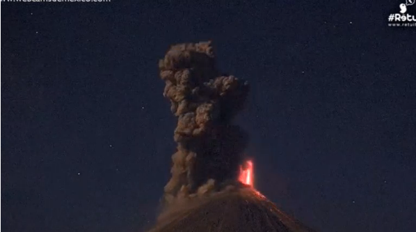 Mexico's Colima volcano continued with intense activity, spewing columns of gas and ash as well as incandescent material during five explosions between dusk on Tuesday (December 13) and early on Wednesday (December 14).(photo grabbed from Reuters video)  