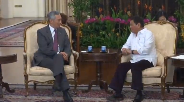 Philippine President Rodrigo Duterte meets with his Singapore counterpart Tony Tan, reaffirming the importance of not interfering in internal affairs among ASEAN (Association of Southeast Asian Nations) states. (Photo grabbed from Reuters video) 