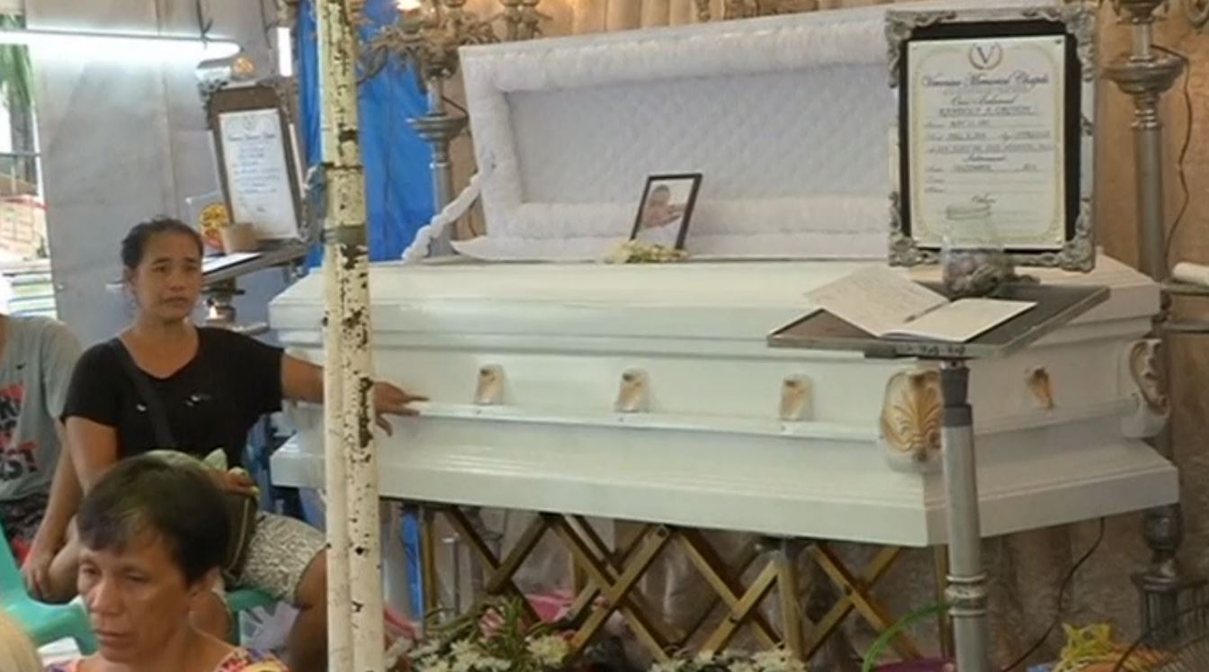 Grace Fonollera sits beside the coffin of her 18-year-old son, Ace Bacorro, at a funeral set up across their shanty home in Manila. Bacorro was killed along with a friend on December 6 when unidentified gunmen shot them while they were out drinking. Families of those killed in Philippine President Rodrigo Duterte's drug war seek justice despite an overwhelming majority in the country supporting the deadly offensive, drawing concern from human rights groups who call for the deaths to be investigated. (Photo grabbed from Reuters video)
