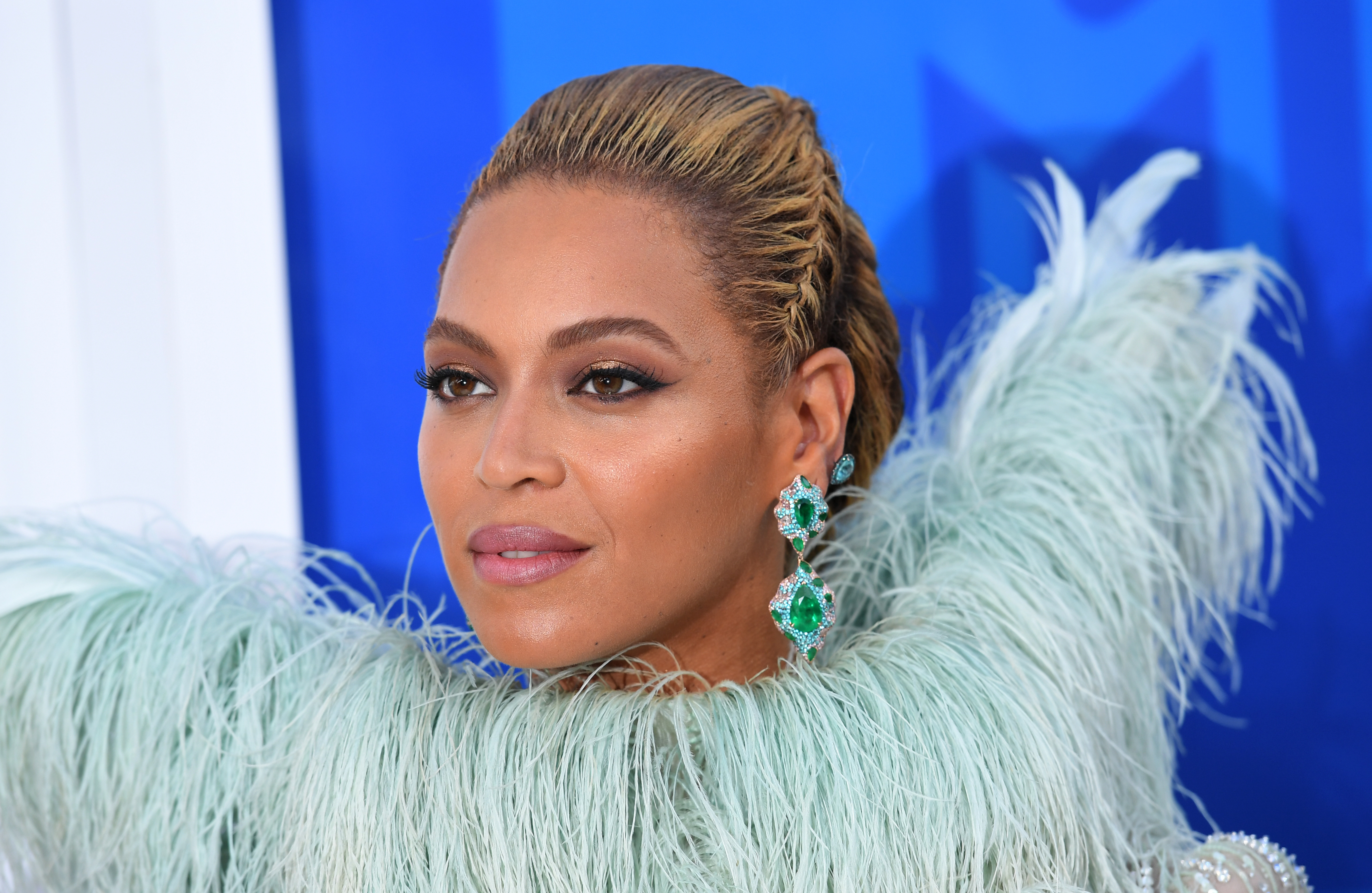 (FILES) This file photo taken on August 28, 2016 shows singer Beyonce during the 2016 MTV Video Music Awards at Madison Square Garden in New York. Pop queen Beyonce, rapper Kendrick Lamar and British rock group Radiohead will headline this year's edition of the Coachella music festival in April, organizers said January 3, 2017. The indie camp-out, which has been getting an increasingly eclectic line-up, will also feature performances from British indie pop band the xx, US folktronica outfit Bon Iver and French house music duo Justice. / AFP PHOTO / Angela Weiss