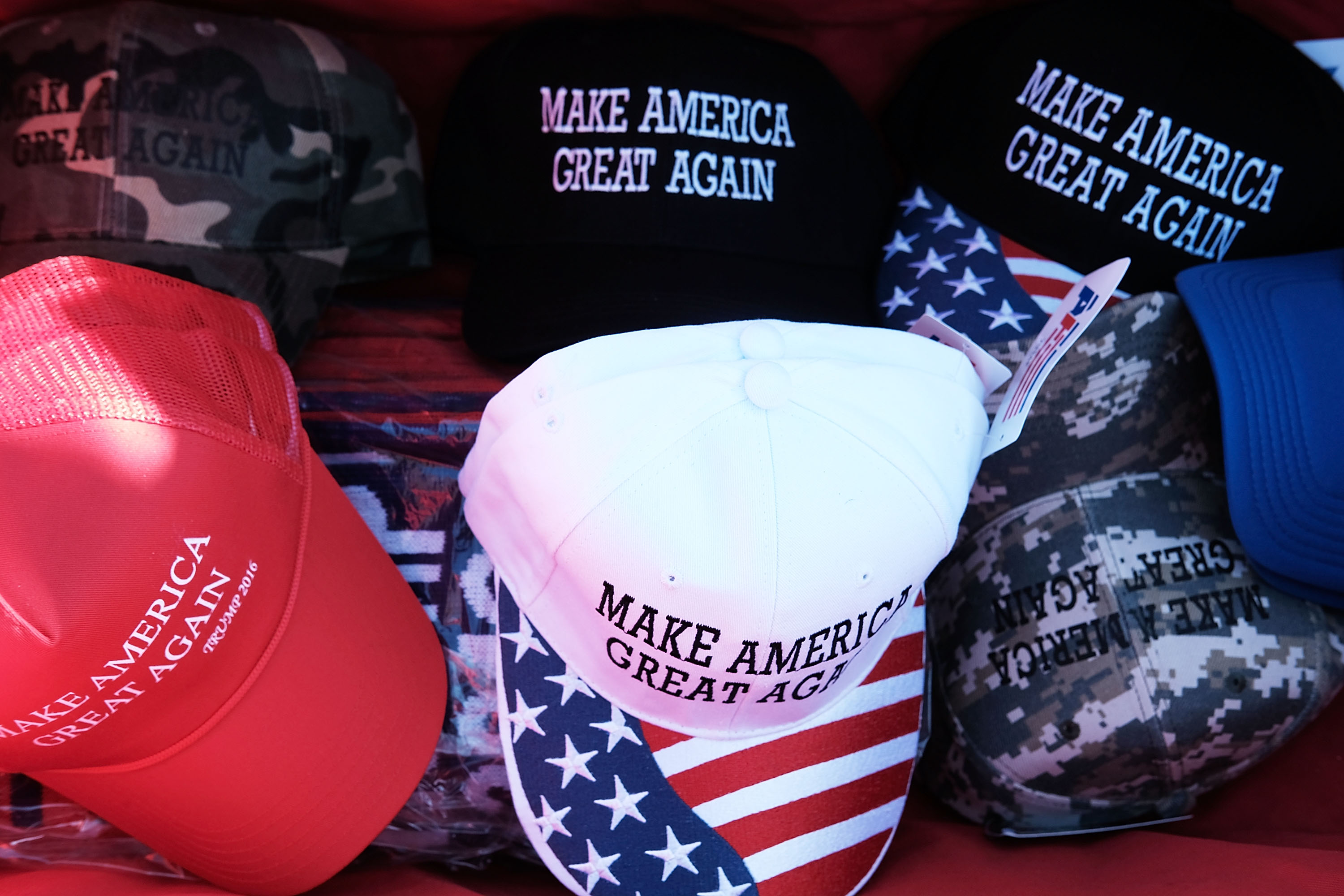 (FILES) This file photo taken on November 3, 2016 shows Donald Trump "Make America Great Again" hats sold at a rally  in Hershey, Pennsylvania.  The Canadian authorities have suspended a judge for wearing a cap with Donald Trump's campaign slogan "Make America Great Again" in court after November's US presidential election, local media reported on January 6, 2017. Ontario Court Judge Bernd Zabel "stopped being assigned to preside in court December 21, 2016," court spokeswoman Kate Andrew told the local daily The Hamilton Spectator without commenting about his future.  / AFP PHOTO / GETTY IMAGES NORTH AMERICA / SPENCER PLATT