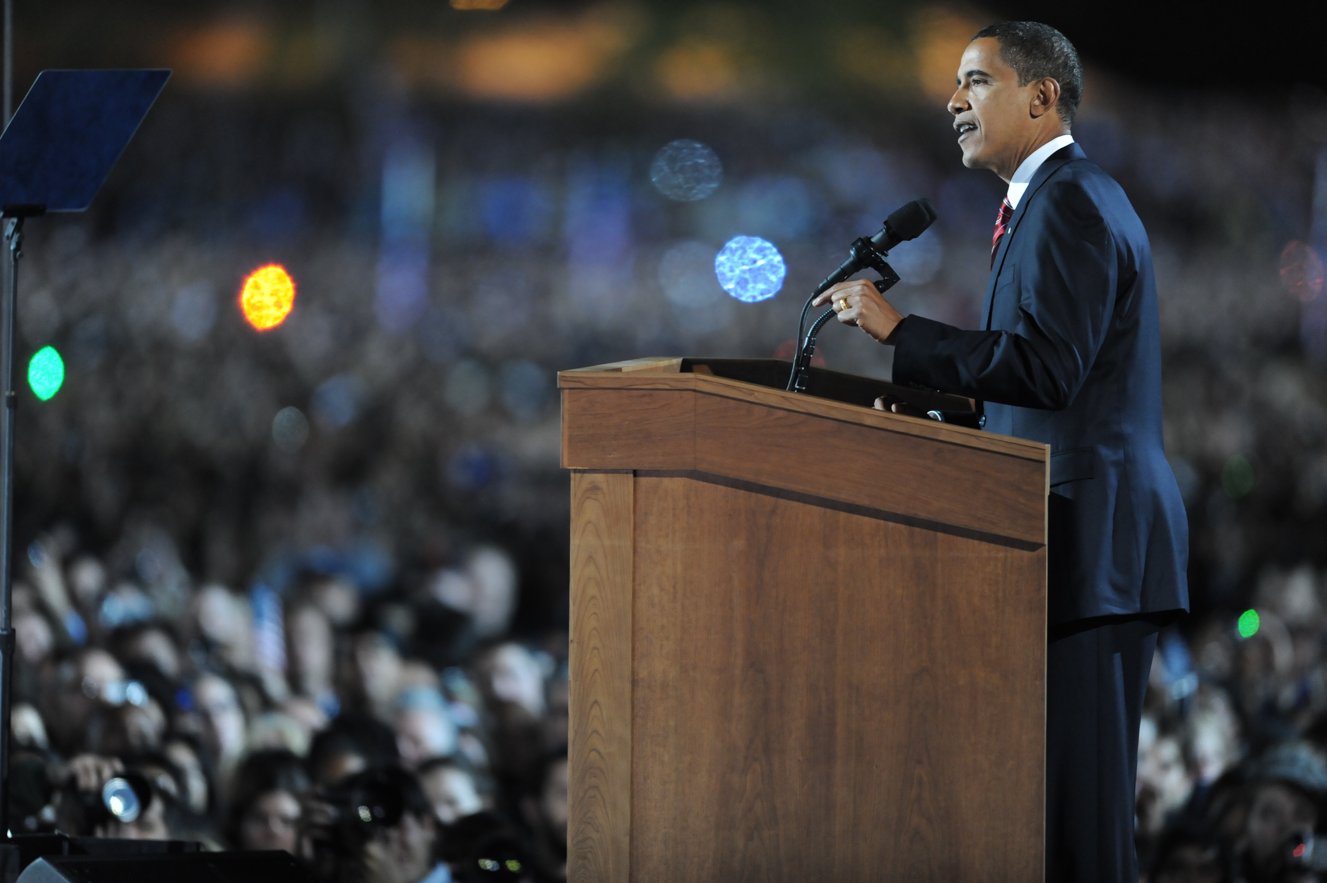 (FILES) This file photo taken on November 5, 2008 shows then Democratic presidential candidate Barack Obama as he addresses supporters during his election night rally at Grant Park in Chicago, Illinois. Barack Obama travels to Chicago for his farewell speech on January 10, 2017, returning to the town where his meteoric rise to become America's first black president all began. The third largest US city is also important to his post-presidency: it will be home to the Obama presidential library and foundation. / AFP PHOTO / JEWEL SAMAD