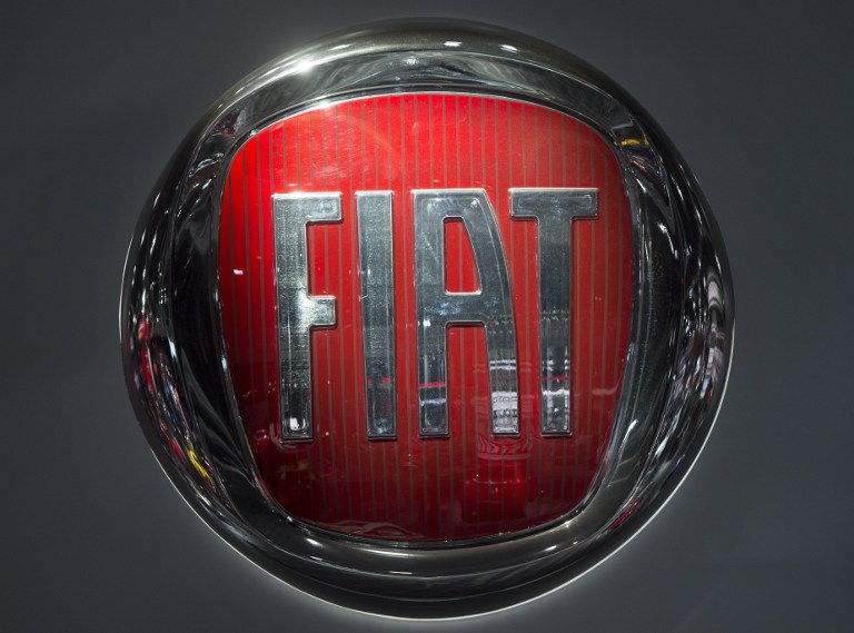 (FILES) This file photo taken on January 10, 2017 shows the Fiat logo during the 2017 North American International Auto Show in Detroit, Michigan. The United States on January 12, 2017 charged Fiat Chrysler with using software on its trucks to evade emissions standards on about 104,000 vehicles.The Environmental Protection Agency said the undisclosed software on the 2014 to 2016 models of Grand Cherokees and Dodge Ram 1500 trucks sold in the United States allowed the vehicles to emit more nitrogen oxides than permitted.The company already is facing two class-action lawsuits over use of the defeat software.  / AFP PHOTO / SAUL LOEB