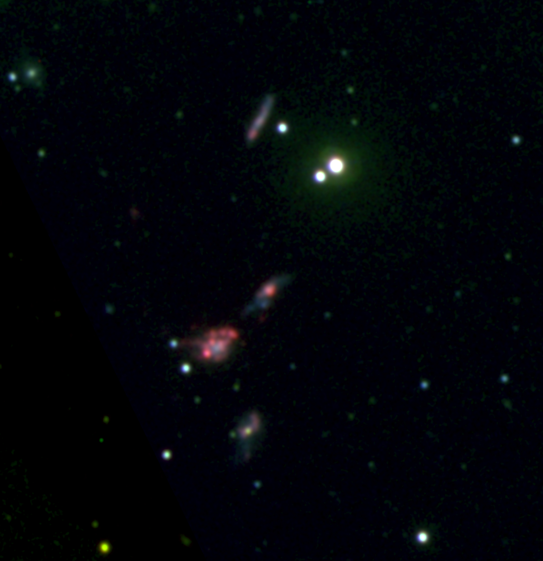A handout photo released on January 23, 2017 by the Nature Publishing Group shows four of the dwarf galaxies. The first sighting of clustered dwarf galaxies bolsters a leading theory about how big galaxies such as our Milky Way are formed, and how dark matter binds them, researchers said on January 23. Theorised but never seen, the bundled galaxies were discovered using the largest optical survey of the night sky ever compiled, they reported in the journal Nature Astronomy. Seven clusters of three-to-five galaxies are each 10 to 1,000 times smaller than the Milky Way.  / AFP PHOTO / NATURE PUBLISHING GROUP / Kelsey E Johnson, Sandra E Liss, and Sabrina Stierwalt / RESTRICTED TO EDITORIAL USE - MANDATORY CREDIT "AFP PHOTO / NATURE PUBLISHING GROUP / Kelsey E Johnson, Sandra E Liss, and Sabrina Stierwalt" - NO MARKETING NO ADVERTISING CAMPAIGNS - DISTRIBUTED AS A SERVICE TO CLIENTS