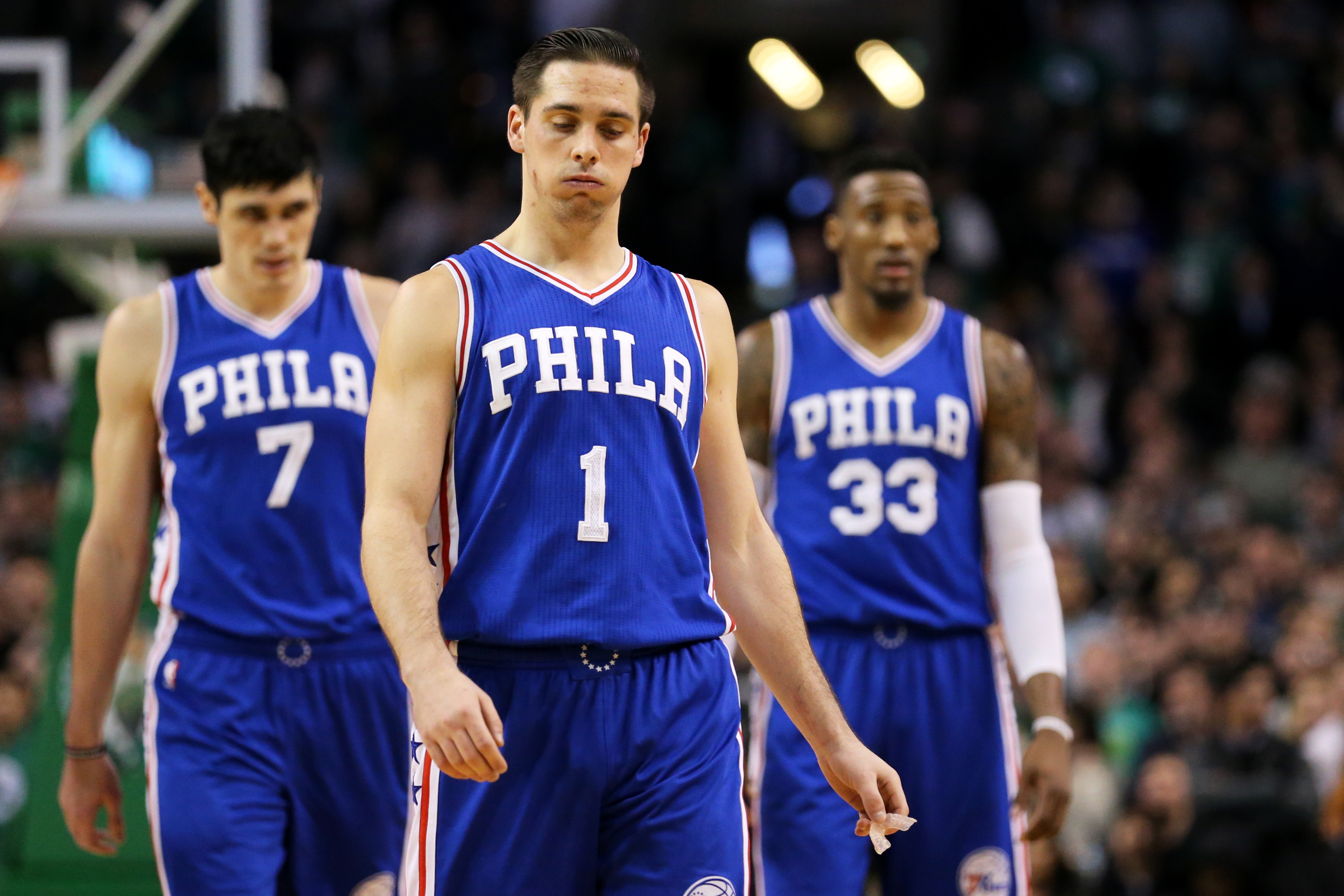 BOSTON, MA - JANUARY 6: T.J. McConnell #1 of the Philadelphia 76ers reacts during the fourth quarter against the Boston Celtics at TD Garden on January 6, 2017 in Boston, Massachusetts. The Celtics defeat the 76ers 110-106. NOTE TO USER: User expressly acknowledges and agrees that , by downloading and or using this photograph, User is consenting to the terms and conditions of the Getty Images License Agreement. Maddie Meyer/Getty Images/AFP