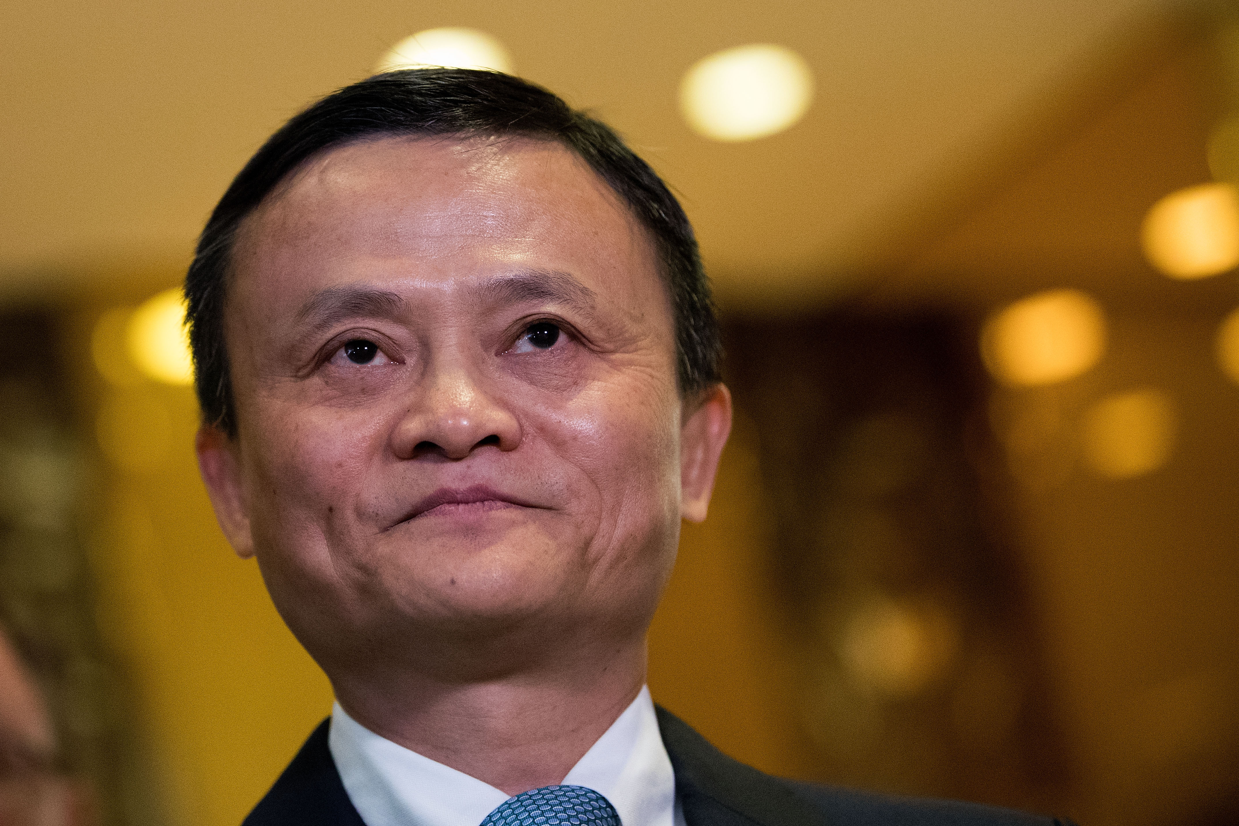 NEW YORK, NY - JANUARY 9: Jack Ma, Chairman of Alibaba Group, speaks with reporters following his meeting with President-elect Donald Trump at Trump Tower, January 9, 2017 in New York City. President-elect Donald Trump and his transition team are in the process of filling cabinet and other high level positions for the new administration. Drew Angerer/Getty Images/AFP