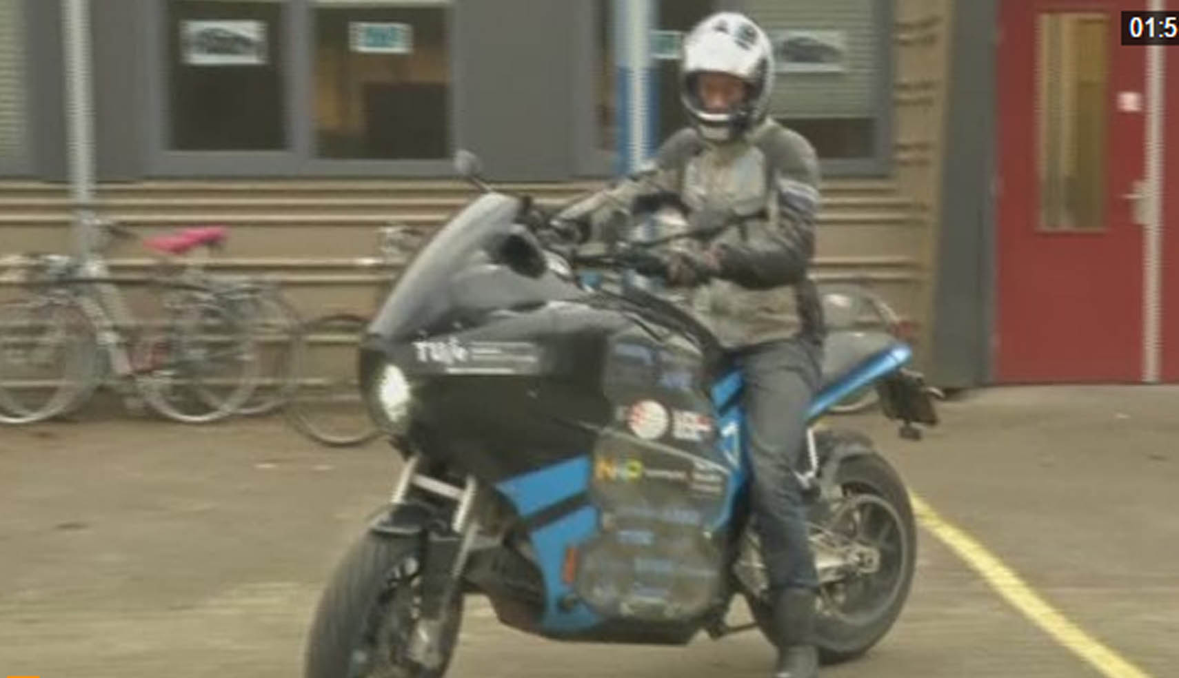 Students who built an electric motorbike from scratch have successfully completed an 80-day ride around the world. (Photo courtesy to Reuters video)
