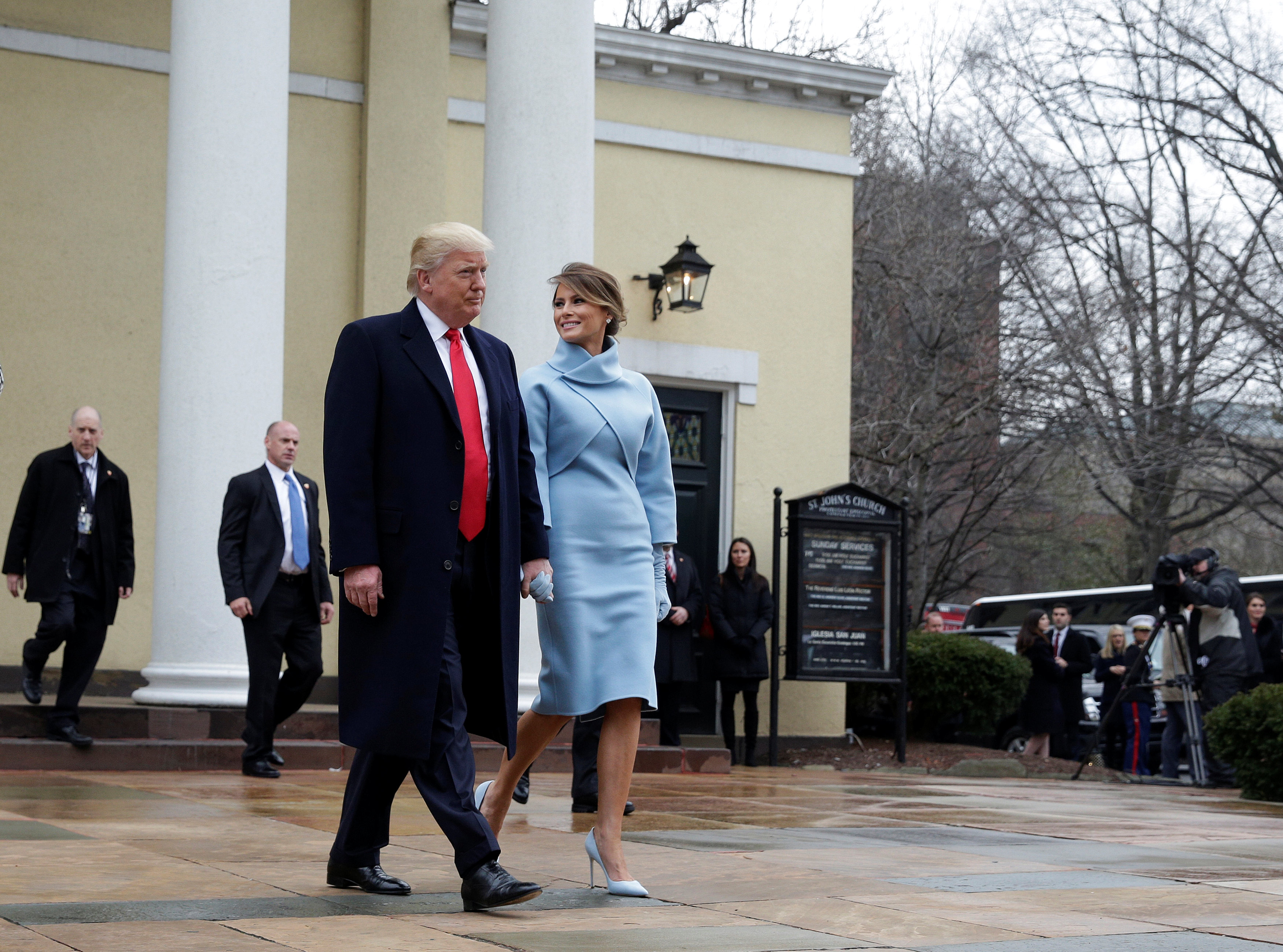 President-elect Donald Trump and his wife Melania depart from services at St. John's Church during his inauguration in Washington, U.S., January 20, 2017. REUTERS/Joshua Roberts
