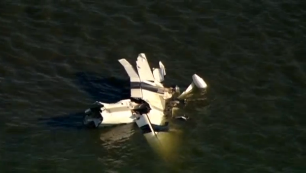 A light plane crashes into the Swan River killing the two people on board during Australia Day celebrations in Perth(photo grabbed from Reuters video)