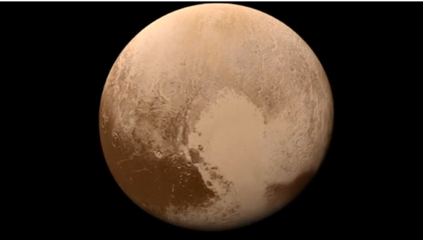 An animated sequence of images released by NASA bring the surface of the dwarf planet Pluto into sharp relief.(photo grabbed from Reuters video)