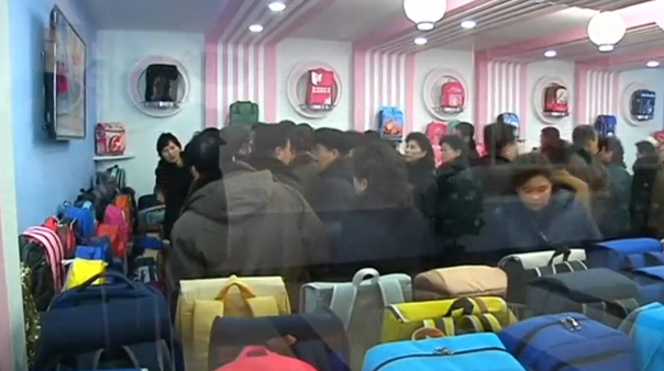 A newly built bag factory begins operation in Pyongyang. (Photo grabbed from Reuters video)