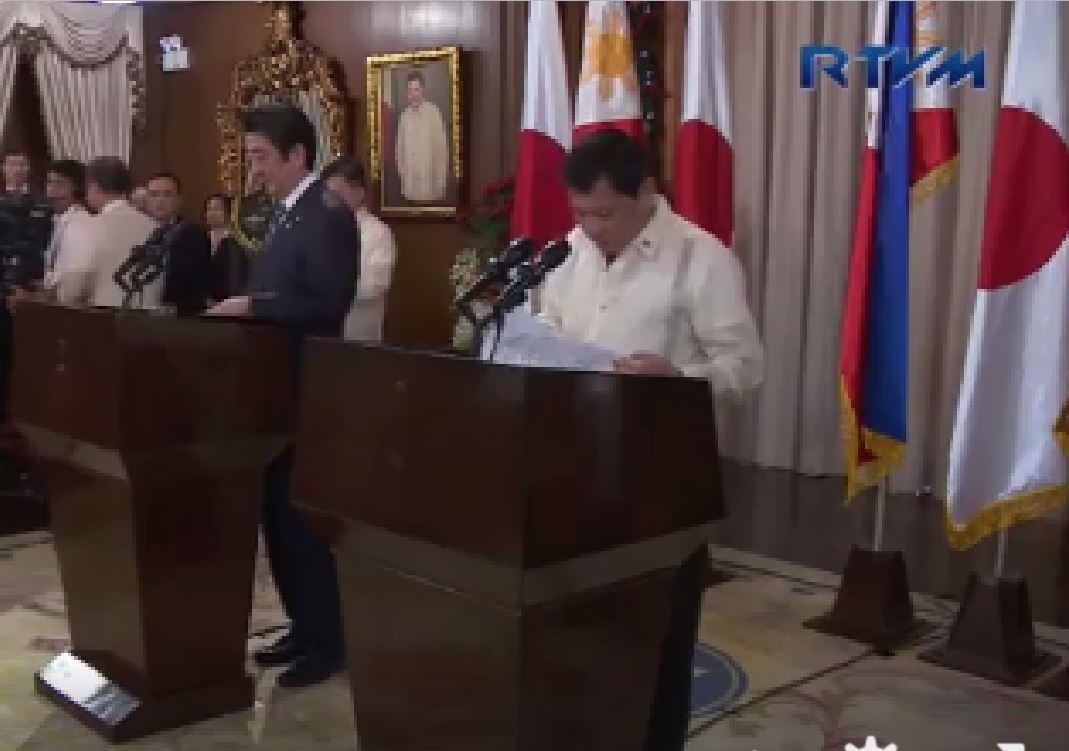 Japanese Prime Minister Shinzo Abe and Philippine President Rodrigo Duterte prepare to issue their joint statements in Malacanang shortly after their "productive meeting" on bilateral agreements. Japan PM Abe arrived Thursday afternoon in Manila for his two-day official visit. (Photo grabbed from RTVM video)