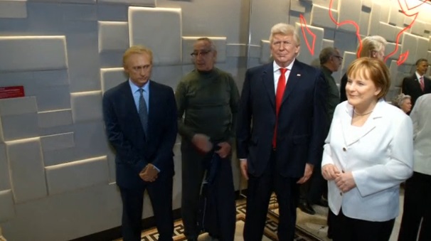 Donald Trump takes the place of Barack Obama a day early... at the Paris Wax Museum, where a statue of him stands between those of German Chancellor Angela Merkel and Russian President Vladimir Putin.