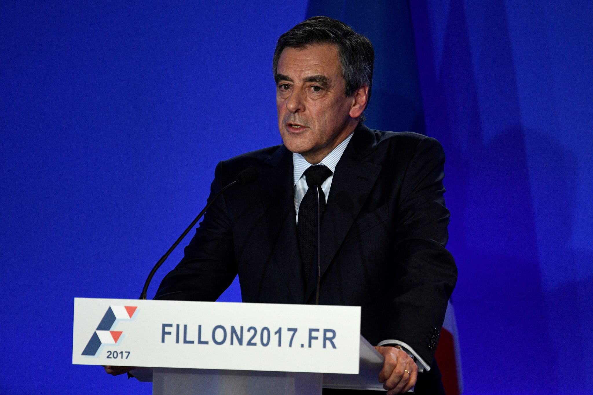 French presidential election candidate for the right-wing Les Republicains (LR) party Francois Fillon gives a press conference focused on "fake job" allegations, on February 6, 2017 at his campaign headquarters in Paris. Fillon's presidential bid has been floundering since it emerged that his wife Penelope earned more than 800,000 euros ($860,000) over a decade as a parliamentary aide to her husband and an ally. / AFP PHOTO / Martin BUREAU