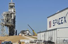 Space X's Falcon 9 rocket is prepared for a launch to the International Space Station February 17, 2017 at the Kennedy Space Center, Florida on LC39A, one of the renovated Space Shuttle launch pads that SpaceX leases from NASA. The Falcon 9 with a Dragon spacecraft is scheduled to be launched February 18. / AFP PHOTO / BRUCE WEAVER