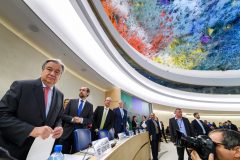 UN Secretary-General Antonio Guterres (L) looks on at the opening of the United Nations Human Rights Council on February 27, 2017 in Geneva. The United Nations Human Rights Council opens its main annual session, with the US taking its seat for the first time under President Donald Trump's leadership. / AFP PHOTO / Fabrice COFFRINI