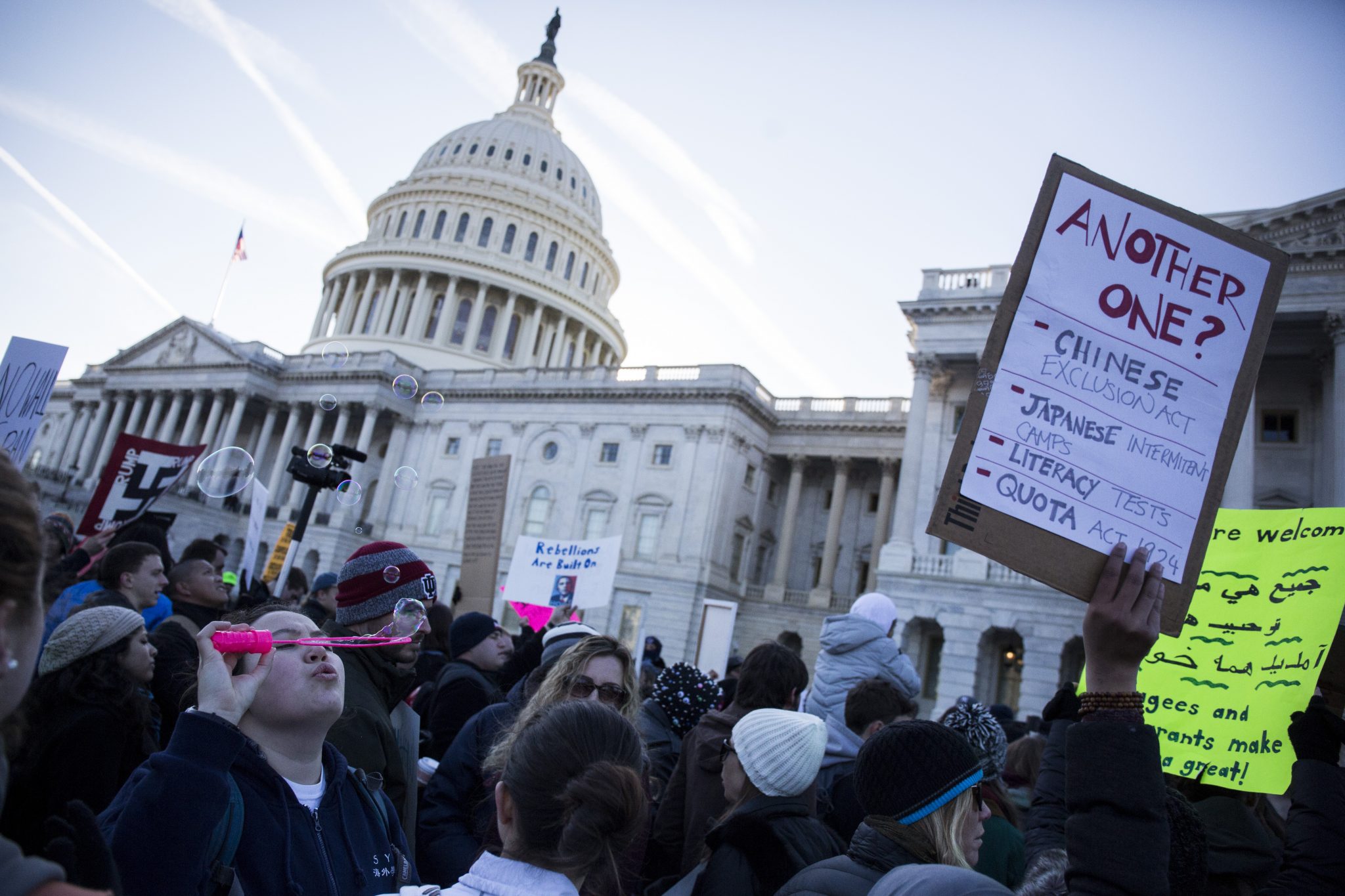 WASHINGTON, DC - FEBRUARY 04: Demonstrators gather in front of the Capitol Building on February 4, 2017 in Washington, DC. The demonstration was aimed at President Donald Trump's travel ban policy.   Zach Gibson/Getty Images/AFP