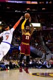 CLEVELAND, OH - FEBRUARY 23: LeBron James #23 of the Cleveland Cavaliers shoots over Carmelo Anthony #7 of the New York Knicks during the second half at Quicken Loans Arena on February 23, 2017 in Cleveland, Ohio. The Cavaliers defeated the Knicks 119-104. NOTE TO USER: User expressly acknowledges and agrees that, by downloading and/or using this photograph, user is consenting to the terms and conditions of the Getty Images License Agreement.   Jason Miller/Getty Images/AFP