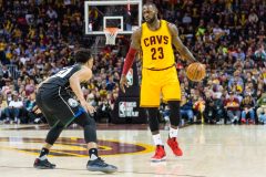 CLEVELAND, OH - FEBRUARY 27: Rashad Vaughn #20 of the Milwaukee Bucks guards LeBron James #23 of the Cleveland Cavaliers during the second half at Quicken Loans Arena on February 27, 2017 in Cleveland, Ohio. The Cavaliers defeated the Bucks 102-95. NOTE TO USER: User expressly acknowledges and agrees that, by downloading and/or using this photograph, user is consenting to the terms and conditions of the Getty Images License Agreement.   Jason Miller/Getty Images/AFP