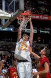 FILE - Actor, Basketball Player and Britain's Tallest Man Neil Fingleton Dies Aged 36 29 Mar 2000: Neil Fingleton #42 of Team East makes a slam dunk during the McDonalds High School All - American game against Team West at The Fleet Center in Boston, Massachusetts. The West defeated the East 146-120.