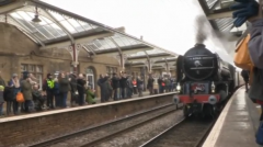 A time-tabled steam train service runs in Britain for the first time in half a century.(photo grabbed from Reuters video)