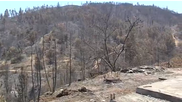 It's a double-whammy for some Chilean families who lost their houses in the deadly Chilean forest fires seven years after struggling in the wake of 2010's earthquake and tsunami.(photo grabbed from Reuters video) 