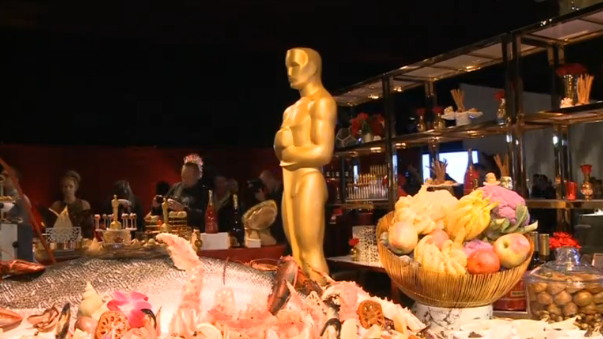 The creative team behind the annual Governors Ball, including celebrity chef Wolfgang Puck, offer a first glimpse at what stars will be treated to at this year's official Oscars after party. (Photo grabbed from Reuters video)